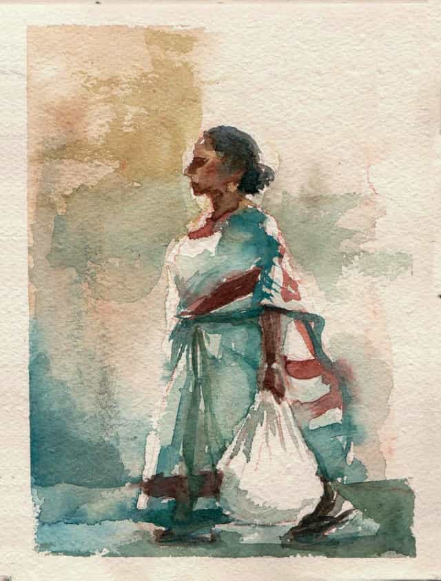 A bengali woman carries